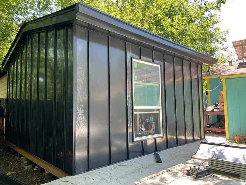 Black standing seam metal wall panels for Metal Roof Installation in Seaside